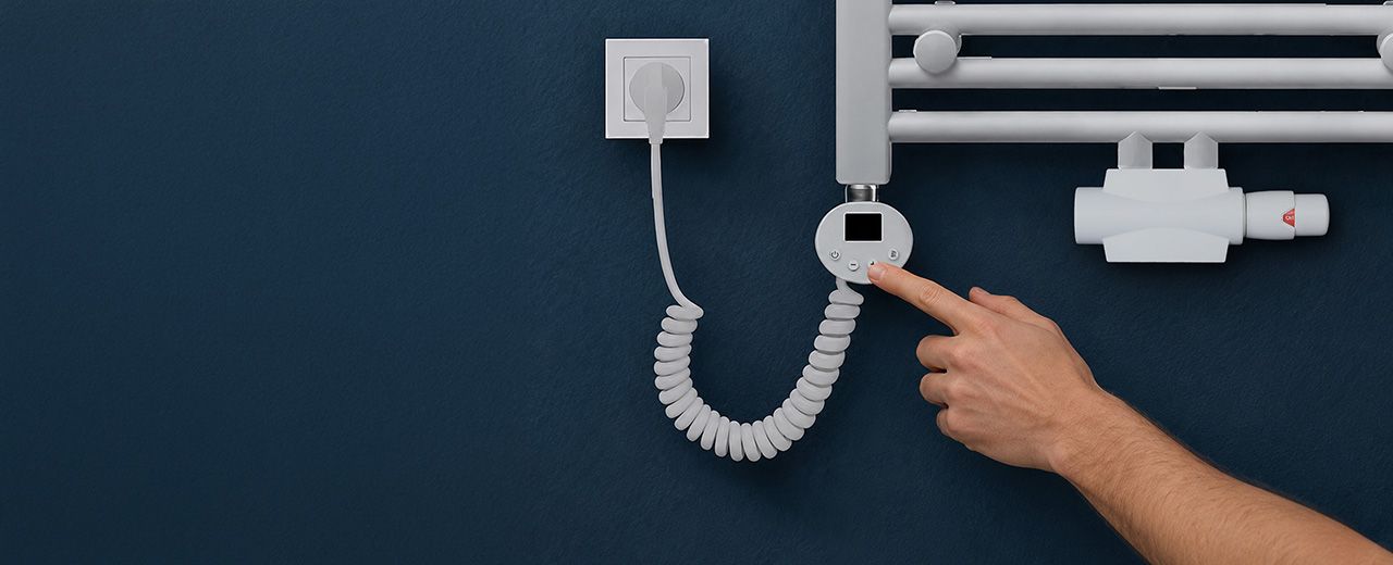 Jak zamontować grzałkę elektryczną w grzejniku łazienkowym podłączonym do centralnego ogrzewania?